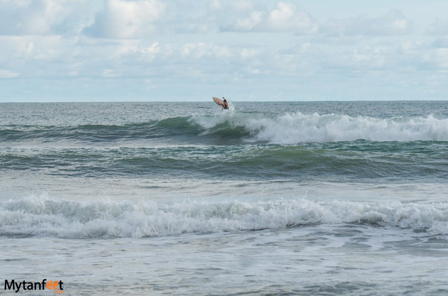 Surfing Dominical beach